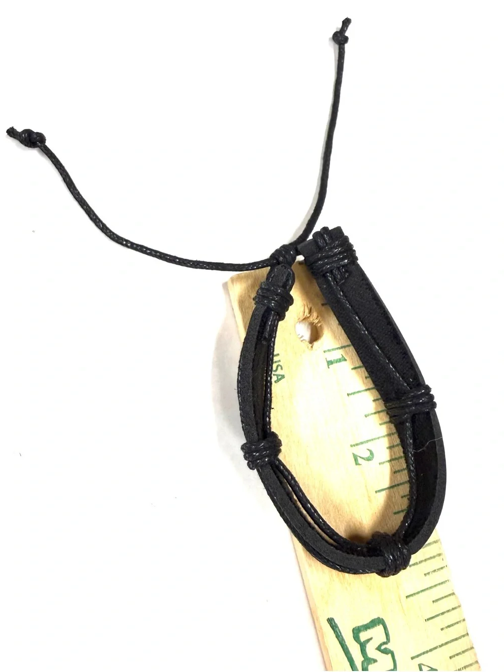 Black leather unisex bracelet with braided rope accents and ties nsb